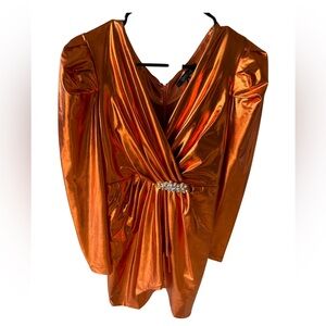 Orange patent leather dress with metallic rhinestone embellishment